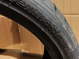 a close up of a tire with a box in the background