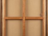 an old wooden window frame with a window pane in the middle