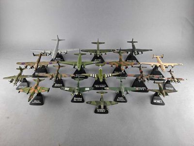 a lot of toy airplanes that are sitting on a table