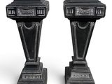 pair of antique black marble pedestals on white background