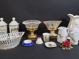 many different types of vases and bowls on the table