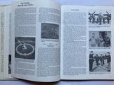 an open book with pictures of people in military uniforms