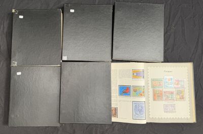 four black folders with stamps on them sitting on a table