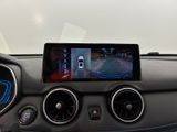 a picture of a car dashboard with a tablet on it