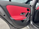 the interior of a car with the door open showing the interior of the vehicle