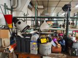 a room filled with lots of clutter and tools