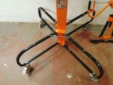 a picture of a small table with wheels on it