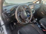 the interior of a car with a steering wheel, dashboard, and dash board