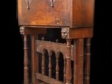 an old wooden table with a drawer on top of it on a black background
