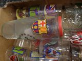 a box full of empty soda bottles and cans