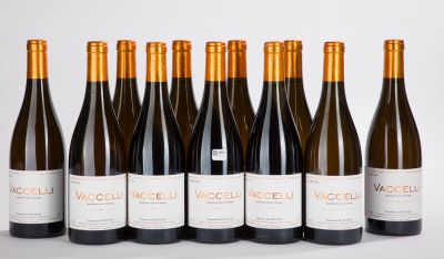 six bottles of wine are lined up in a row