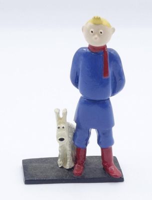 figurine of a man with a dog on a black base