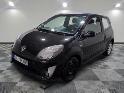 a picture of a small black car on a checkered floor