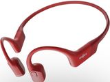 une paire d'écouteurs rouges posés les uns sur les autres