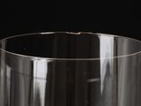 a close up of a glass of wine on a table