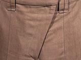 a close up of a person ' s pants with a belt