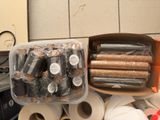 many rolls of toilet paper and rolls of toilet paper on the counter