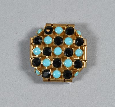 ANONYME. Broche damier de strass noir et bleu turquoise sur …