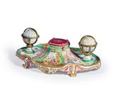a small table with a globe on top of it