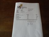 a piece of paper with a receipt on it on a table