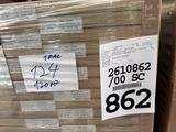 a large stack of boxes with price tags on them