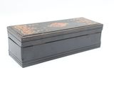 an image of a black box with flowers on it on a white background