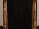 an image of a mirror on a table in a room