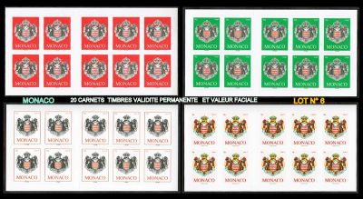 quatre timbres différents, de couleurs et de motifs variés, sur fond noir