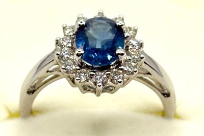 an image of a blue sapphire and diamond ring