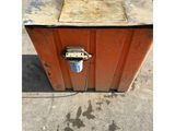 a small orange box with a phone on top of it