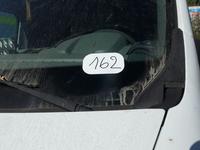 a car with a sticker on the windshield of it
