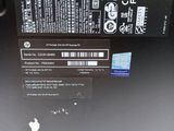 a close up of the back of an apple laptop