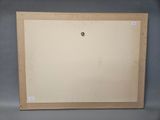 an old picture of a picture frame with a button on it