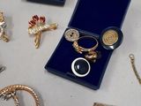 many different types of jewelry on the table
