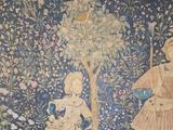 a tapestry of a woman and a child in a garden