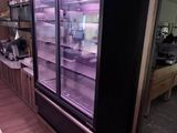 an image of a kitchen with a refrigerator and sink in it
