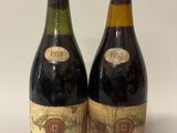 deux bouteilles de vin posées l'une à côté de l'autre sur une table