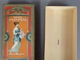 an image of a small box with a picture of a woman in a dress