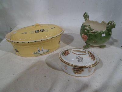 two bowls and a bowl sitting on a table