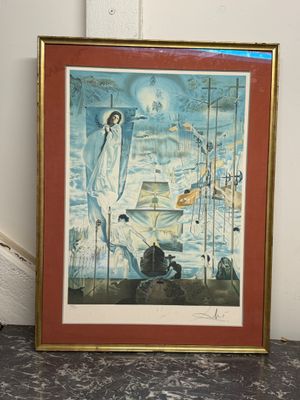 tableau encadré représentant une femme sur un bateau en pleine mer