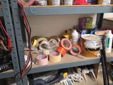 a shelf with many different items on it in a room