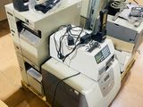 many electronic equipment sitting on top of each other