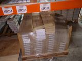 a large stack of boxes sitting on a pallet in a warehouse