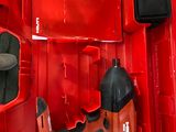 a red tool box with tools inside of it