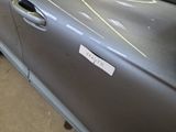 a sticker on the door of a car that has a sticker on it
