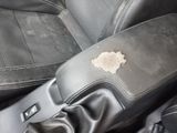 an image of a car seat with a patch on it
