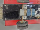 a toy car that is sitting on top of a red box
