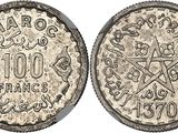 a silver coin with a star on the front and a star on the back