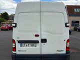 a white van that is parked in a parking lot