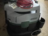 a vacuum cleaner that is sitting on the floor